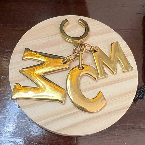 Authentic Pre-Loved MCM Bag Keychain / Bag Charm Gold-tone. - Picture 1 of 3
